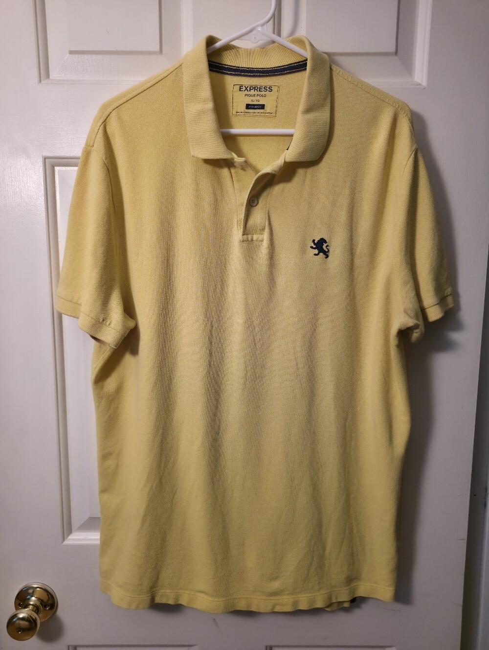 Express Men’s Light Yellow Polo with Navy Lion Logo